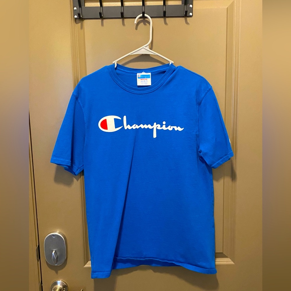 Selling a lightly worn Royal Blue Cotton T-Shirt. Size MEDIUM.